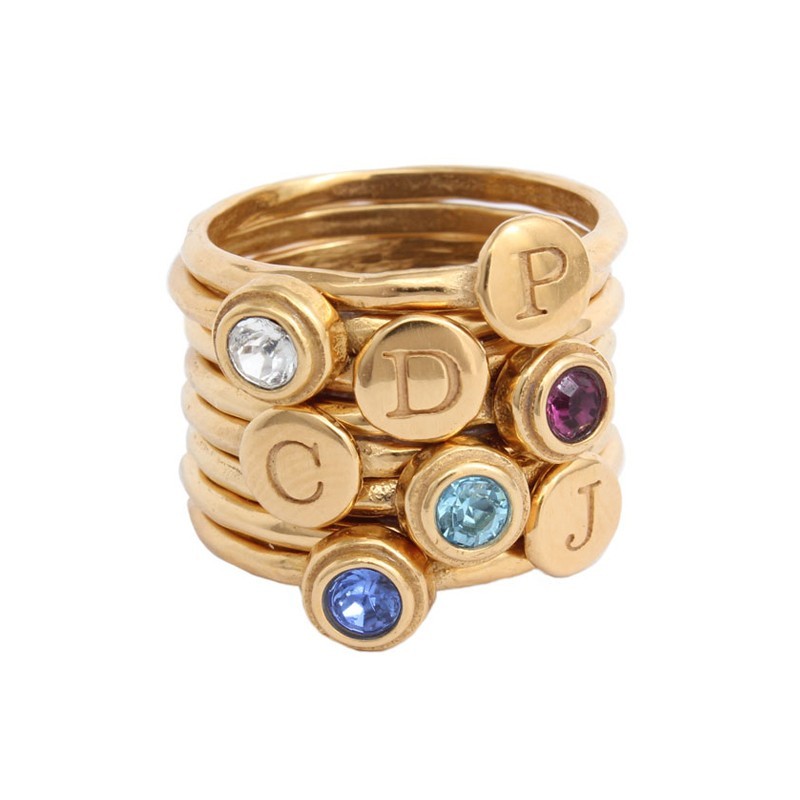 stacked rings in gold for mom of 4