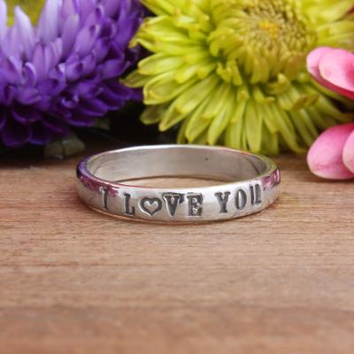 promise ring with names and hearts