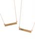 gold birthstone bar necklace on model